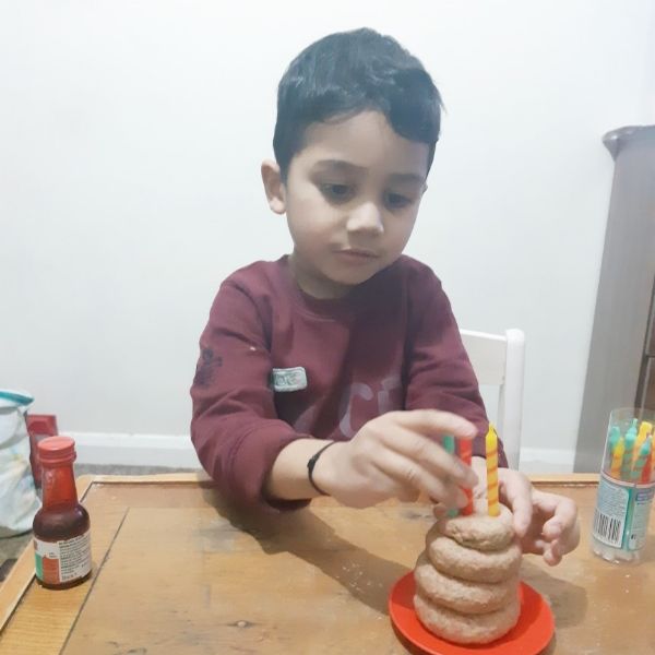 Griezman making a play dough cake