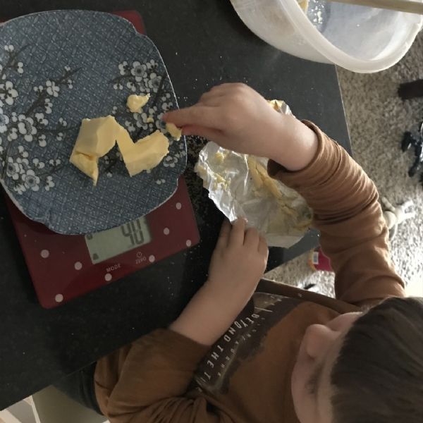 Simon making cake